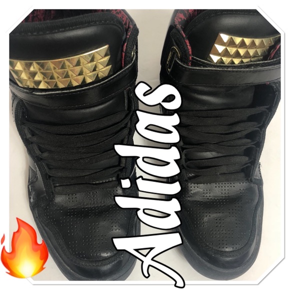 black and gold adidas high tops